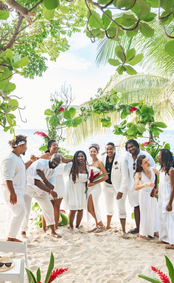 A visible group standing on the sand at Marquis Paradise