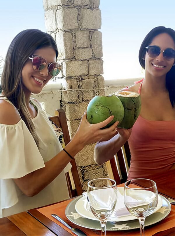 Two visible guests drinking at MArquis Paradise in Labadie Haiti